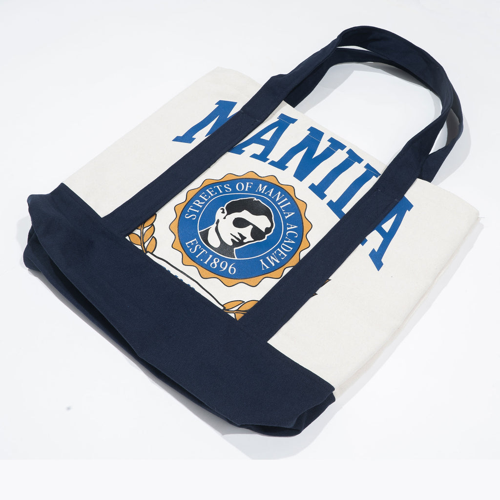 TEAM MANILA TEAM MANILA ACADEMIC CREST TOTE BAG CREAM