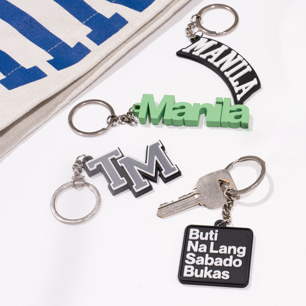 TEAM MANILA SABADO BUKAS KEYCHAIN BLACK | TeamManila Lifestyle